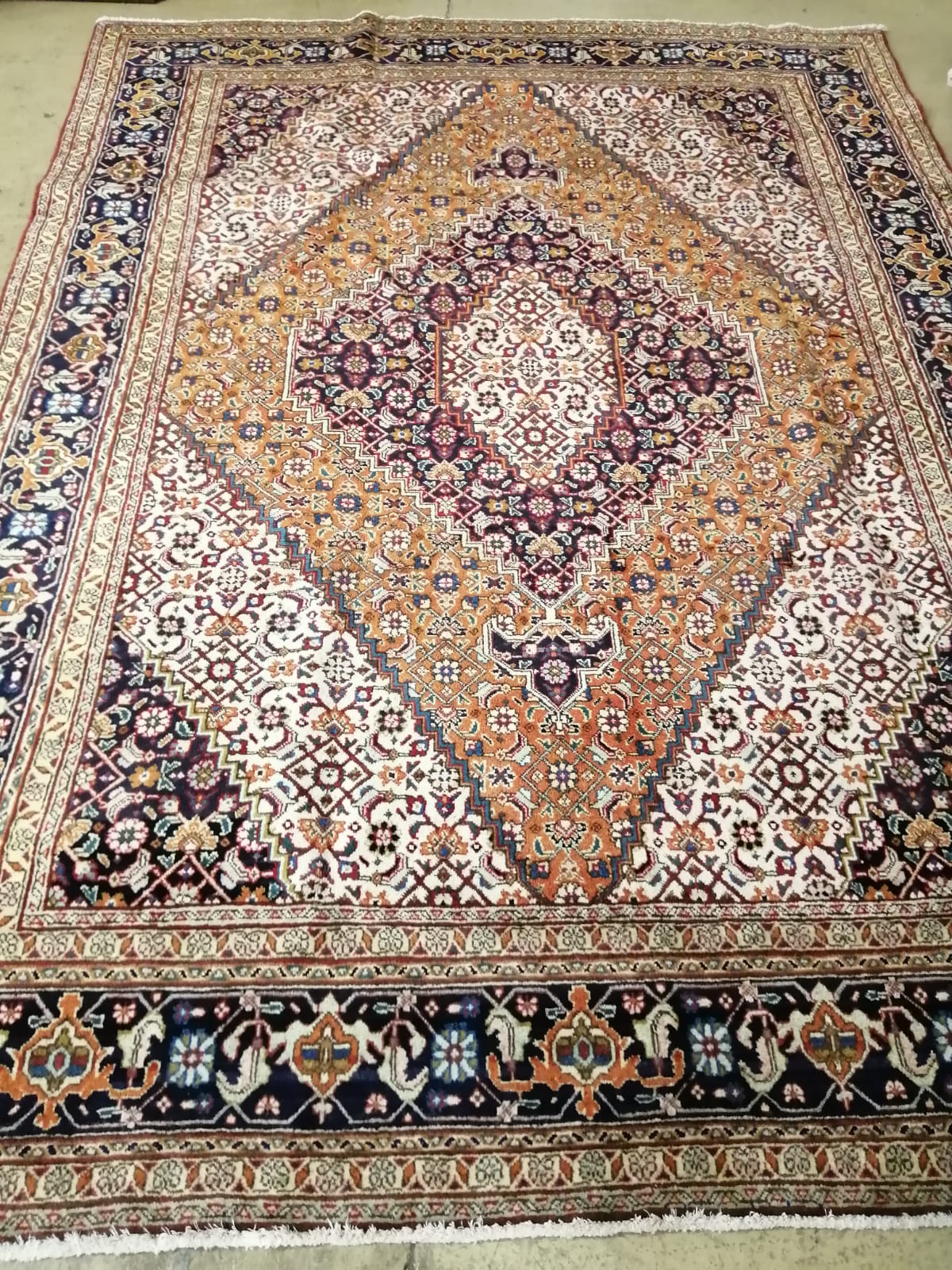 A Tabriz blue ground carpet, 285 x 205cm